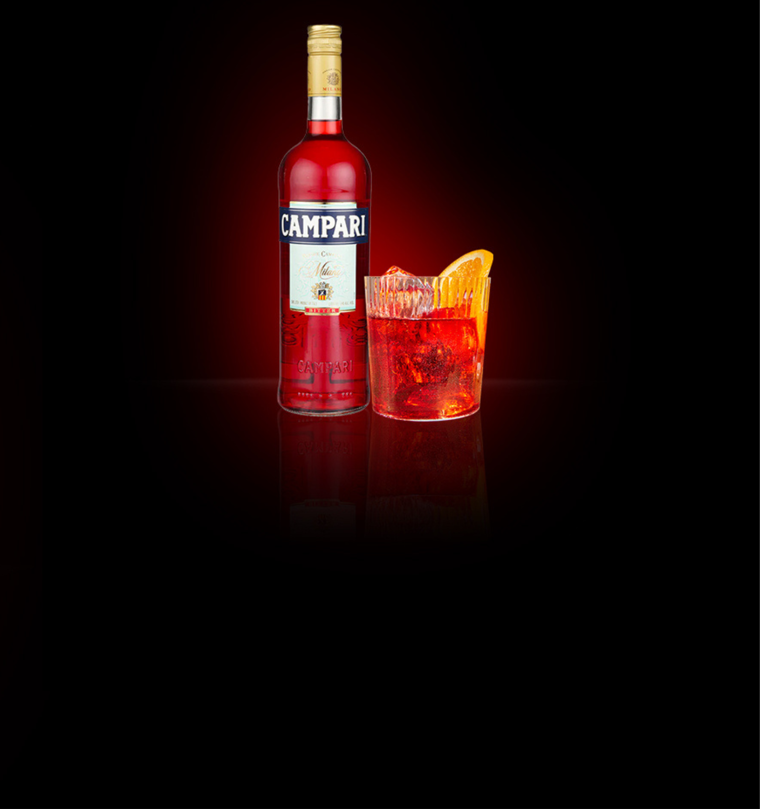 A bottle of Campari with a Kingston Negroni cocktail
